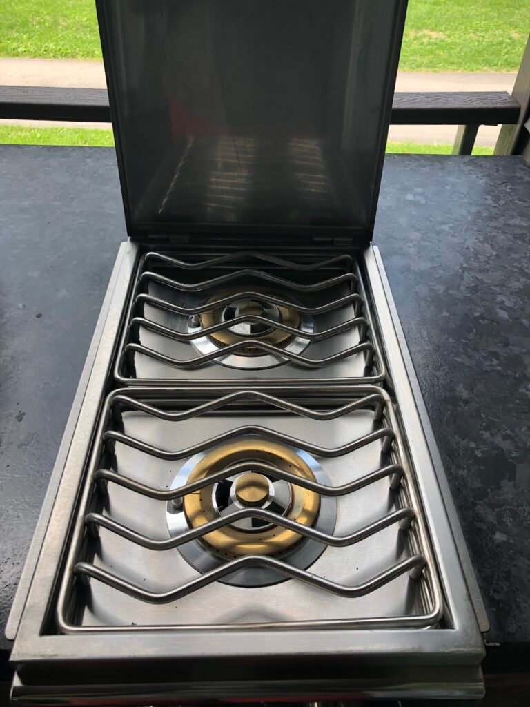 Shiny, like new side burner after our services were completed