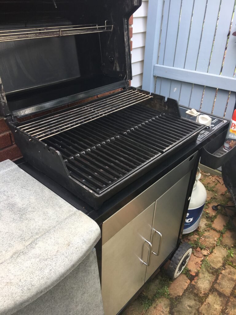 Clean and scrubbed gas grill after a cleaning