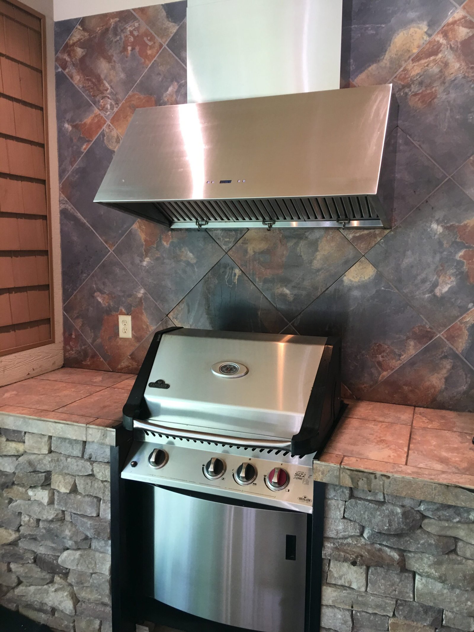 Professional cleaned grill in outdoor kitchen